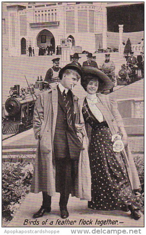 Romantic Couple Wearing Hats and Miiniature Trains