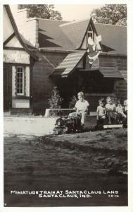 Santa Claus Indiana~Children Ride Mini Miniature Train~St Nick on Roof~RPPC 1945 