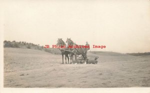 Unknown Location, RPPC, Farmer Rolling a Field