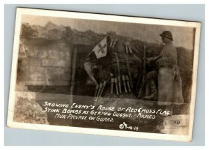 Vintage 1919 RPPC Propaganda Postcard WW1 German Soldier using Red Cross Flag