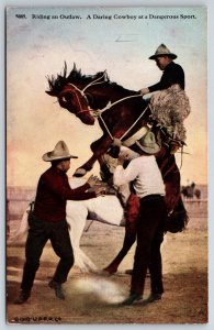 Western~Riding An Outlaw~Daring Cowboy On Bucking Broncho~HH Tammen Vtg Postcard