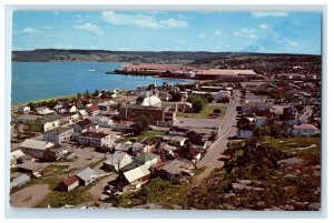 c1960's Scene from Atop a Cliff, Buildings, Bagotville Quebec Canada Postcard