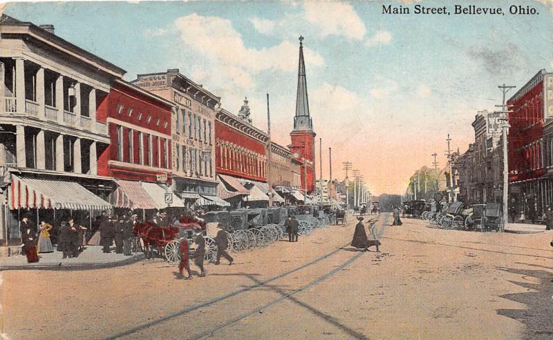 D55/ Bellevue Ohio Postcard 1915 Main Street Crowds Stores