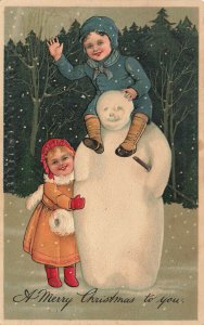 A Merry Christmas Snowman Children P.F.B. 1907 Embossed Postcard