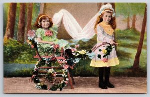 Girls w/Flowered Wheelbarrow Chair Play Wedding~Art Photo~c1910 Vintage Postcard