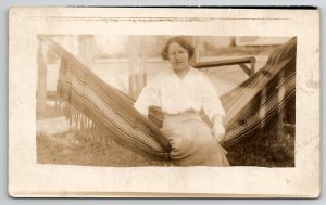 RPPC Pretty Woman Seated On Fringe Hammock Real Photo Postcard N30