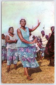 1962 LAGOS INTERNATIONAL TRADE FAIR OWERRI DANCERS VISIT NIGERIA AFRICA POSTCARD