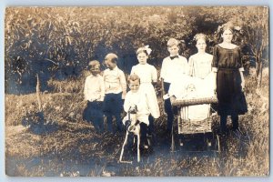 1913 Children Boy Rocking Horse Baby On Stroller RPPC Photo Antique Postcard