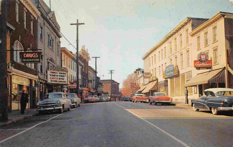 Main Street West Drug Store Theater Cars Walden New York 1950s postcard