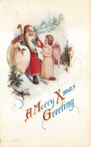 CHRISTMAS HOLIDAY SANTA CLAUS & ANGEL WITH GIFT LIST EMBOSSED POSTCARD 1923 PD