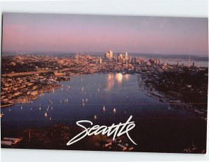 Postcard Sailboats drawn to the shimmery light of Lake Union, Seattle, WA
