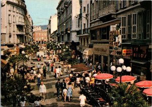 VINTAGE CONTINENTAL SIZE POSTCARD CROWDED STREET SCENE NICE COTE D'AZUR FRANCE