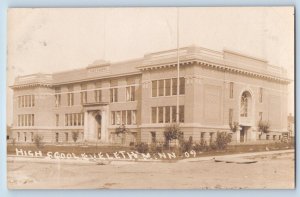 Eveleth Minnesota MN Postcard RPPC Photo High School Building Dirt Road c1910's