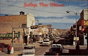 GALLUP NM Street Scene STOREFRONTS OLD PICKUP TRUCKS Postcard