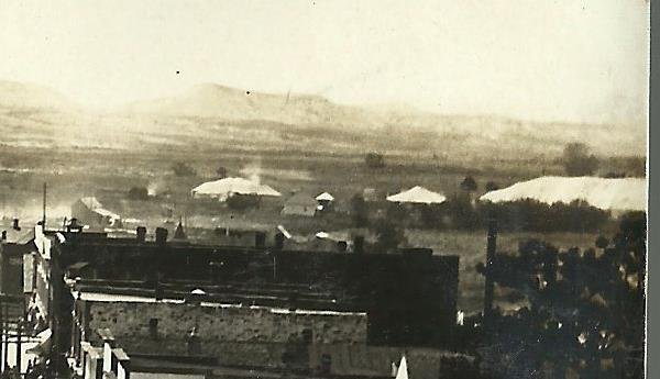 Newcastle WYOMING RPPC 1908 CIRCUS PARADE Main Street WAGONS ELEPHANTS Tents #2