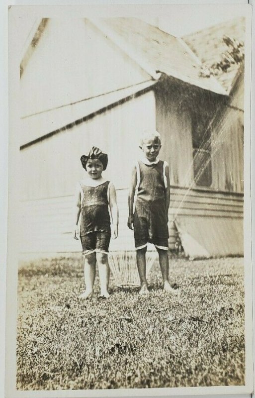 Rppc Children Bathing Suits Summer Fun with the Sprinkler in Yard Postcard O16