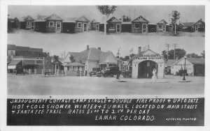 Postcard RPPC 1920s Colorado Lamar Dougherty Cottage Camp gas station 23-11644