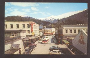 KETCHIKAN ALASKA DOWNTOWN STREET SCENE OLD CARS STORES VINTAGE POSTCARD