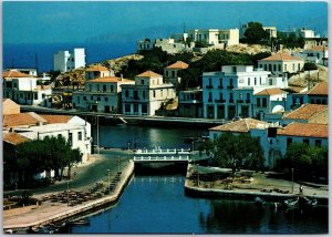 Partial View Of The City And Lake Voulismeni Crete Greece Buildings Postcard