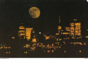 MONTREAL , Quebec , Canada , 1987 ; Moon overhead