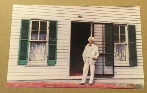 VINT POSTCARD UNUSED MARK TWAIN IN FRONT OF HIS BOYHOOD HOME, HANNIBAL, MISSOURI