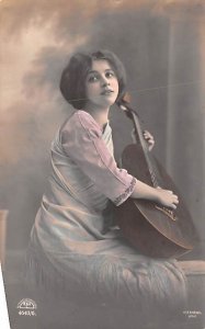 Girl with string instrument real photo 1912 