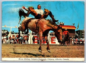 Bronc Riding, Calgary Stampede, Alberta, Postcard Savings Bonds Slogan Cancel