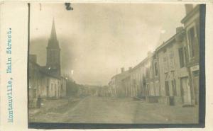 C-1919 Montauville Main Street RPPC Photo Postcard France 3926