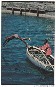 Skillful diver rcovering a coin in the blue water, NASSAU, Bahamas, 40-60s