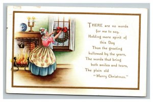 Vintage 1915 Christmas Postcard Woman Hangs Wreath in Window Fireplace Nice Poem