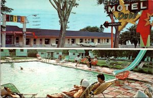 VINTAGE POSTCARD LEISURE SCENES AT MOTEL DUBE' LOCATED RIVIERE-DU-LOUP QUEBEC