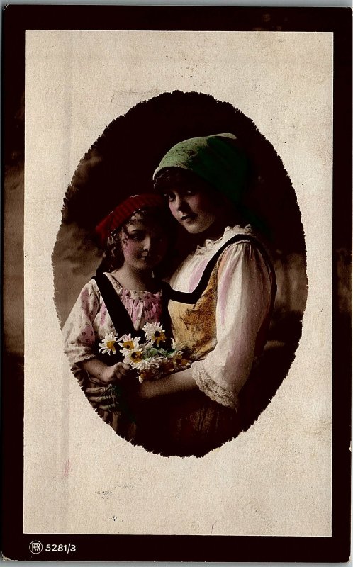 1917 2 YOUNG GIRLS WITH FLOWERS TINTED ROMANIA REAL PHOTO POSTCARD  17-14 