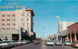 Postcard 1960s Elko Nevada Carl's Cafe Greyhound Bus Depot autos 23-13587