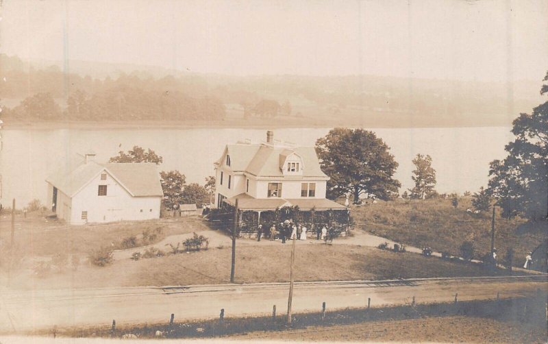 GROUP OF PEOPLE GATHERING A HOUSE ON RIVER~REAL PHOTO POSTCARD 