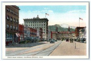 c1930's Pike's Peak Avenue Building Cars Stores Colorado Spring CO Postcard