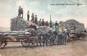 GRAIN OVERFLOW DAVENPORT WASHINGTON HORSES FARMING POSTCARD (c. 1910)