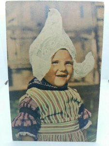 Little Dutch Girl Poses for the Camera Vintage Postcard Posted 1947 Volendam