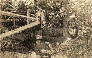 US Army Soldier Picking Oranges Studio Props? Florida? Real Photo Postcard