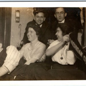 c1910s Gang Men Women Fun RPPC Michigan Pennant Flag Photo Laugh Candid A161