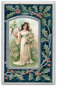 c1910's Christmas Pretty Angel White Lily Flowers Holly Berries Antique Postcard 