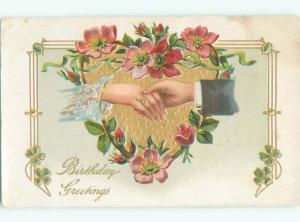 c1910 Valentine HOLDING HANDS WITH FLOWERS AND HEART AC5027