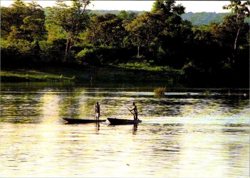 Zambia, Africa  ZAMBEZI RIVER  Men Paddling Boats Upstream   4X6 Postcard