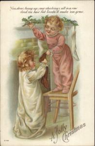 Christmas - Children Hanging Stockings Series C-148 c1910 Postcard