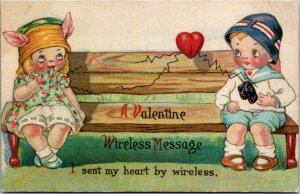 Postcard A Valentine Wireless Message Boy & Girl Sending Heart C.1910 K11