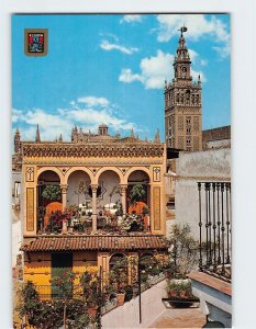 Postcard Sevillian terrace and Giralda, Seville, Spain