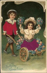 Birthday Boy & Girl Wagon w/ Flowers REAL SILK c1910 Postcard