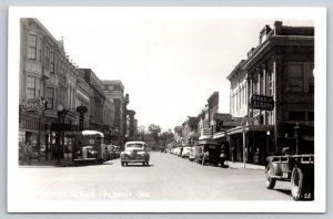 RPPC  Street Scene  Albany  Oregon   Bank  Drug Store Coca Cola Sign   Postcard