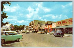 1950's SEBRING FLORIDA RIDGEWOOD AVENUE WW MAC CO STORES CLASSIC CARS POSTCARD