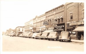 G95/ St Louis Michigan RPPC Postcard c40s Main Street Shoe Store Monroe's 