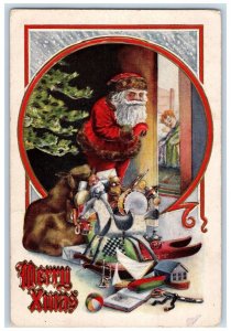 c1910's Christmas Santa Claus Giving Toys Boy Sleeping Bed Embossed Postcard